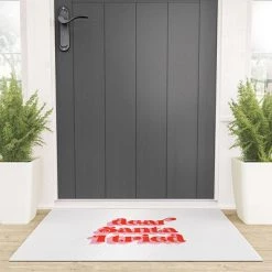 Deny Designs Emanuela Carratoni Dear Santa I tried Welcome Mat -Society6