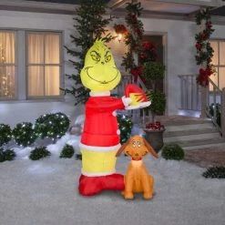The Grinch Grinch Animated Airblown Inflatable Putting Santa Hat on Max Scene Dr. Seuss, 6 ft Tall