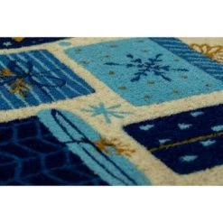 1'4" x 2'4" Christmas Presents Indoor/Outdoor Coir Doormat Blue/Gold - Entryways