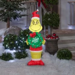The Grinch Grinch Christmas Airblown Inflatable with Wreath, 4 ft Tall, Yellow