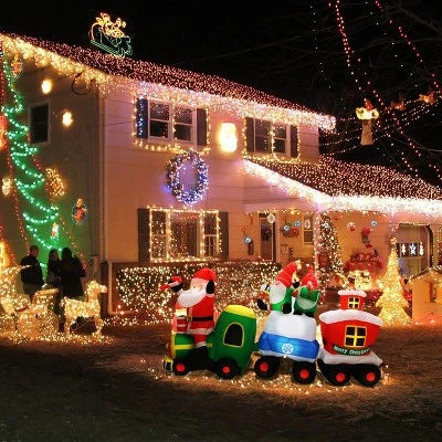 LuxenHome 8Ft Santa and Gnome Elves Train Inflatable Christmas Decorations with LED Lights 4 LuxenHome 8Ft Santa and Gnome Elves Train Inflatable Christmas Decorations with LED Lights - Image 2