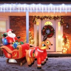 LuxenHome 5Ft Santa Claus and Sleigh with Two Reindeer Holiday Inflatable with LED Lights