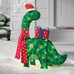 Front Page 23 27.5" Incandescent Green Tinsel Dinosaur with Gift Christmas Novelty Sculpture Light Clear - Wondershop™