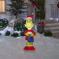 The Grinch Grinch Christmas Airblown Inflatable w/Blue Stocking Dr. Seuss, 4 ft Tall, Multicolored